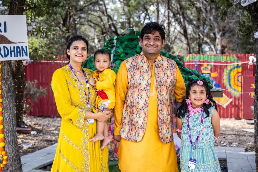 Neha and Umesh Tiwari pose for a portrait with their children during the Krishna Janmashtami festival on Aug. 25, 2024, at ISKCON of Cedar Park. Umesh Tiwari says he is looking for a political and spiritual leader who can bring about a more peaceful world.