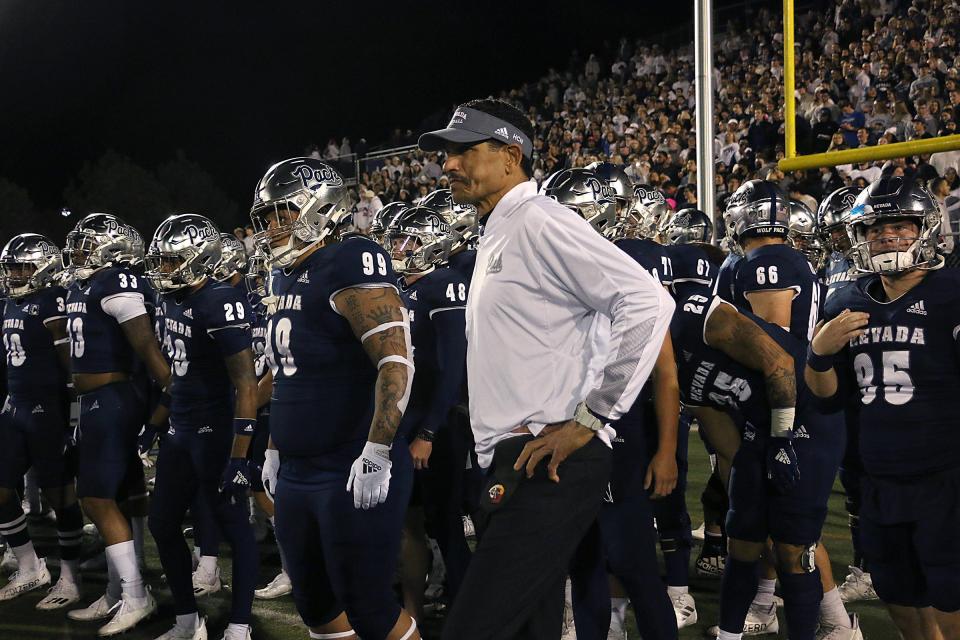 Nevada head coach Jay Norvell leads his team onto the field to take on Hawai'i at Mackay Stadium in Reno on Oct. 16, 2021. JASON BEAN/RGJ / USA TODAY NETWORK