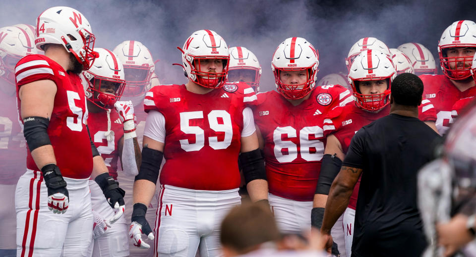 Sep 23, 2023; Lincoln, Nebraska, USA; Nebraska Cornhuskers offensive lineman Bryce Benhart (54), offensive lineman Henry Lutovsky (59), Nebraska Cornhuskers offensive lineman Ben Scott (66) and teammates before the game against the Louisiana Tech Bulldogs at Memorial Stadium. Mandatory Credit: Dylan Widger-USA TODAY Sports