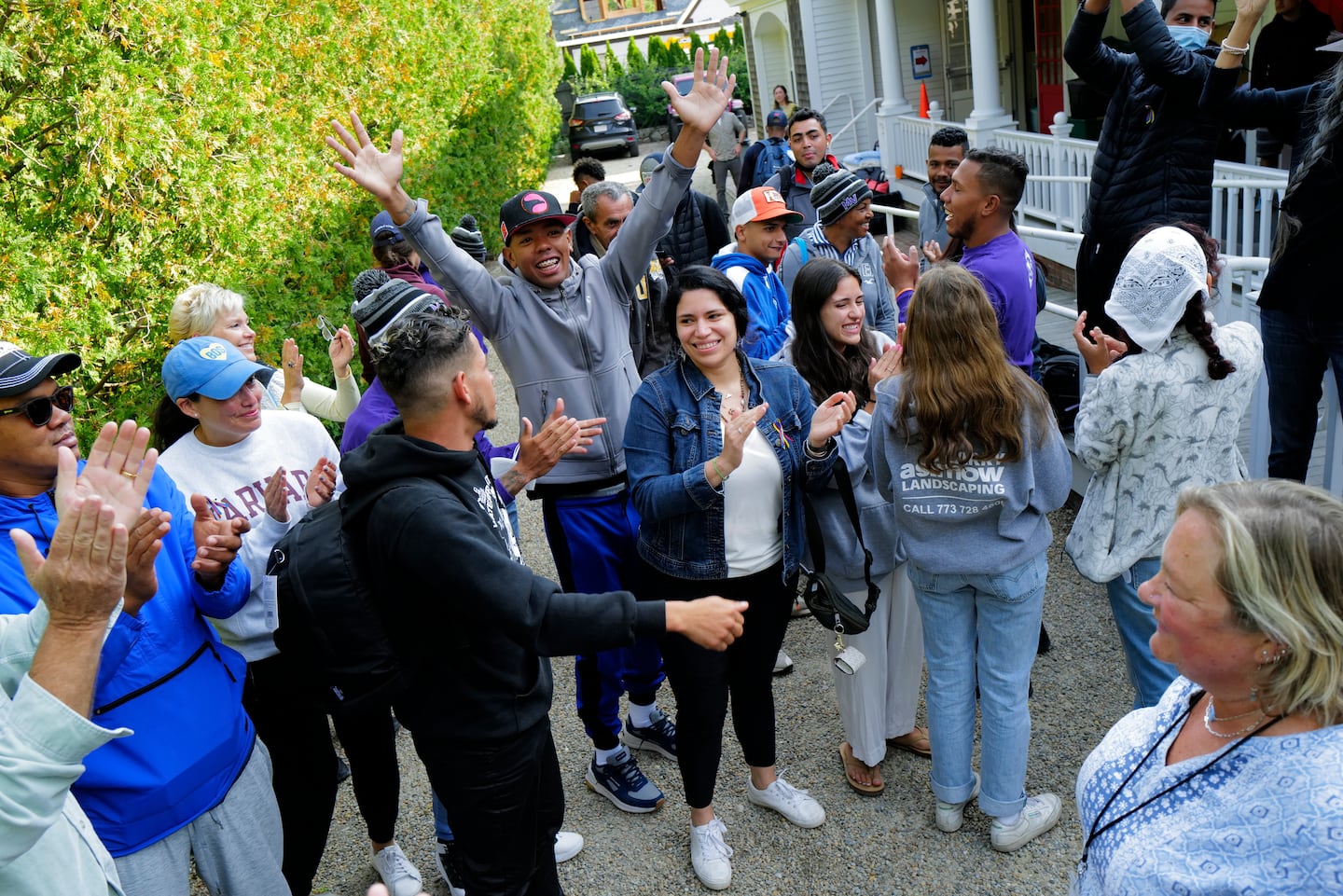 Migrants and volunteers celebrated together outside of St. Andrew's Parish House in Martha’s Vineyard on Sept. 16, 2022.