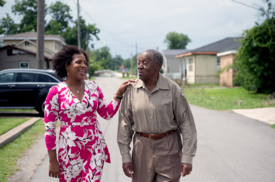 St. Rose, La., resident Kimbrelle Eugene Kyereh, left, says her community suffers from chemical smells emitted by International-Matex Tank Terminals’ bulk liquid storage site. IMTT announced Thursday its installing four air monitoring sensors in Kyereh’s neighborhood in collaboration with the Louisiana Environmental Action Network. She is seen walking down her street with her father, Alphonse Eugene Sr.