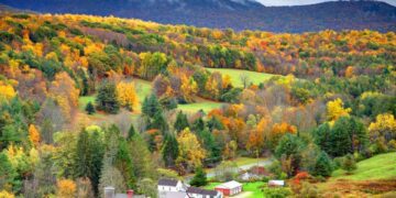 Autumn foliage in the Bershire Hills region of Massachusetts. Photo taken from a scenic viewpoint of the Mount Greylock Range during the peak fall foliage season. The Berkshires region enjoys a vibrant tourism industry based on music, arts, and recreation.