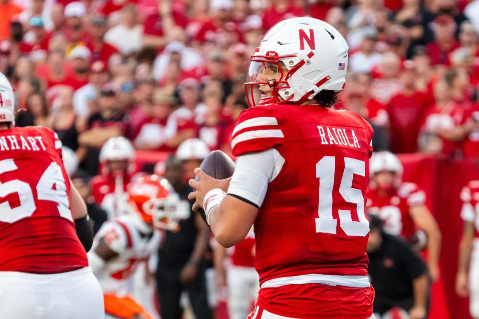 Sep 20, 2024; Lincoln, Nebraska, USA; Nebraska Cornhuskers quarterback Dylan Raiola (15) drops to throw against the Illinois Fighting Illini during the first quarter at Memorial Stadium. Mandatory Credit: Dylan Widger-Imagn Images