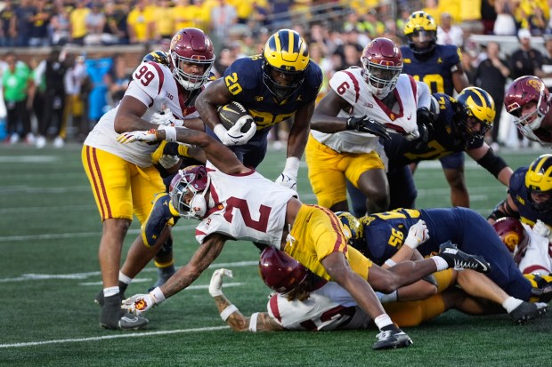 Michigan running back Kalel Mullings (20) runs against Southern California...