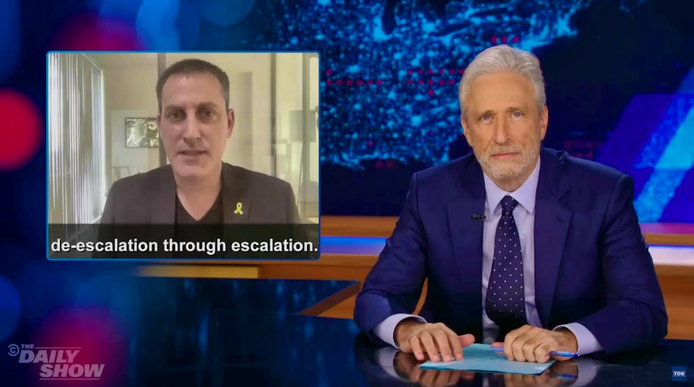 De-escalation through ... Escalation? Jon Stewart is skeptical. On the left in the picture: CNN man Barak Ravid.