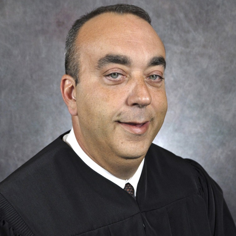 District Judge Kevin Mullins. 