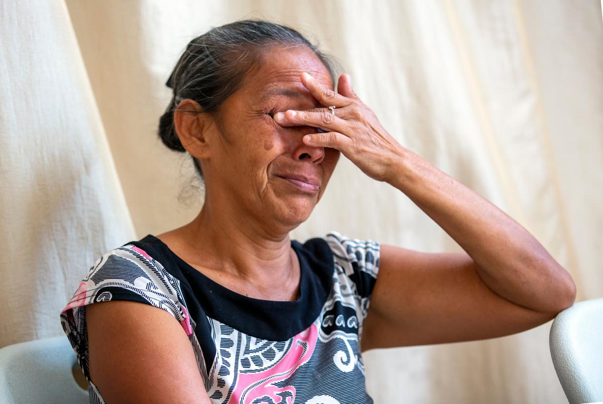 Guatemalan migrant Gloria Lobos cries while speaking about violence she and her family experienced, during an interview at a church-run shelter in Ciudad Juarez, Mexico, on Friday, Aug. 9, 2024.