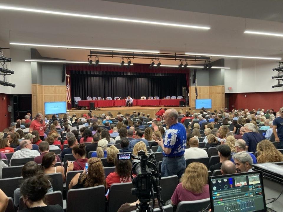 Over 500 people filled the auditorium at Indian Valley Middle School in Harleysville on Aug. 29, most demanding the resignation of board member Bill Formica. The district is now checking identification to give residents priority seating, possibly running afoul of open meetings laws.