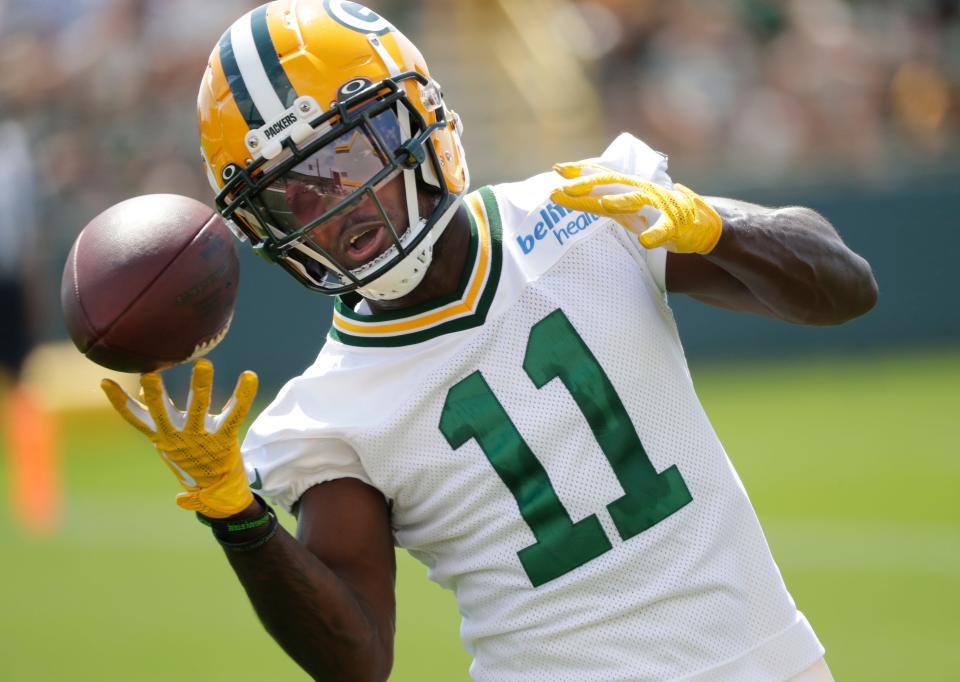 Jul 27, 2023; Green Bay, WI, USA; Green Bay Packers wide receiver Jayden Reed (11) makes a catch during training camp at Ray Nitschke Filed. Mandatory Credit: Daniel Powers-USA TODAY Sports ORG XMIT: IMAGN-713962 ORIG FILE ID: 20230727_gav_usa_186 .jpg