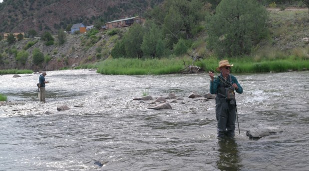 Roger Hill, right, fishes in the Arkansas River near Cotopaxi along with Don Holmstrom co-chair go backcountry, hunters, and anglers on Saturday, Aug. 24, 2024. (Photo courtesy of Cody Perry)