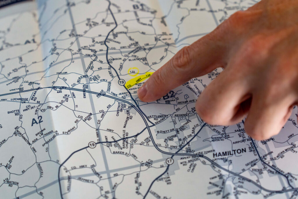 Michael McClung points to his neighborhood on a map of Marion County. Credit: Lee Hedgepeth/Inside Climate News