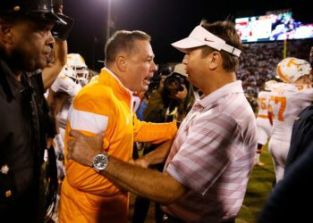 Sep 13, 2014; Norman, OK; Oklahoma Sooners head coach Bob Stoops shakes hands with Tennessee Volunteers head coach Butch Jones after the game at Gaylord Family - Oklahoma Memorial Stadium. Mandatory Credit: Kevin Jairaj-USA TODAY Sports