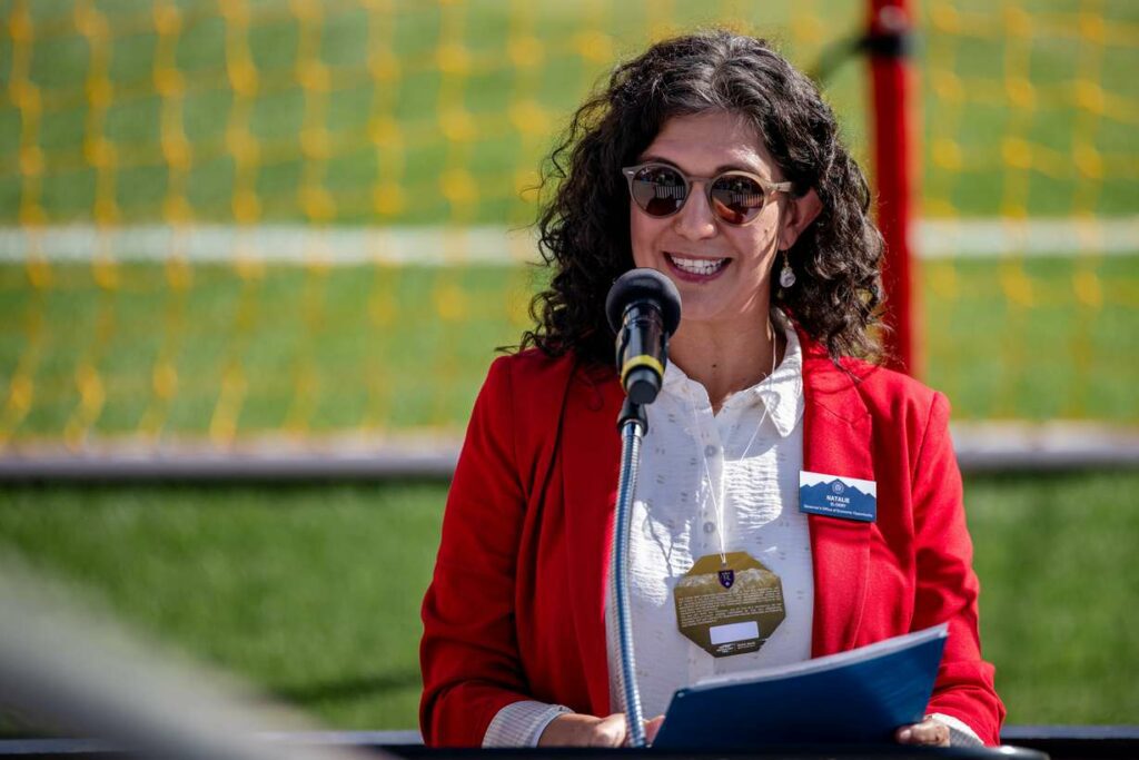 Natalie El-Deiry, who heads the Utah Center for Global Talent and New Americans, speaks at a Sept. 18 naturalization ceremony at the Real Salt Lake stadium in Sandy.