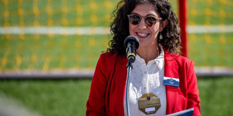 Natalie El-Deiry, who heads the Utah Center for Global Talent and New Americans, speaks at a Sept. 18 naturalization ceremony at the Real Salt Lake stadium in Sandy.