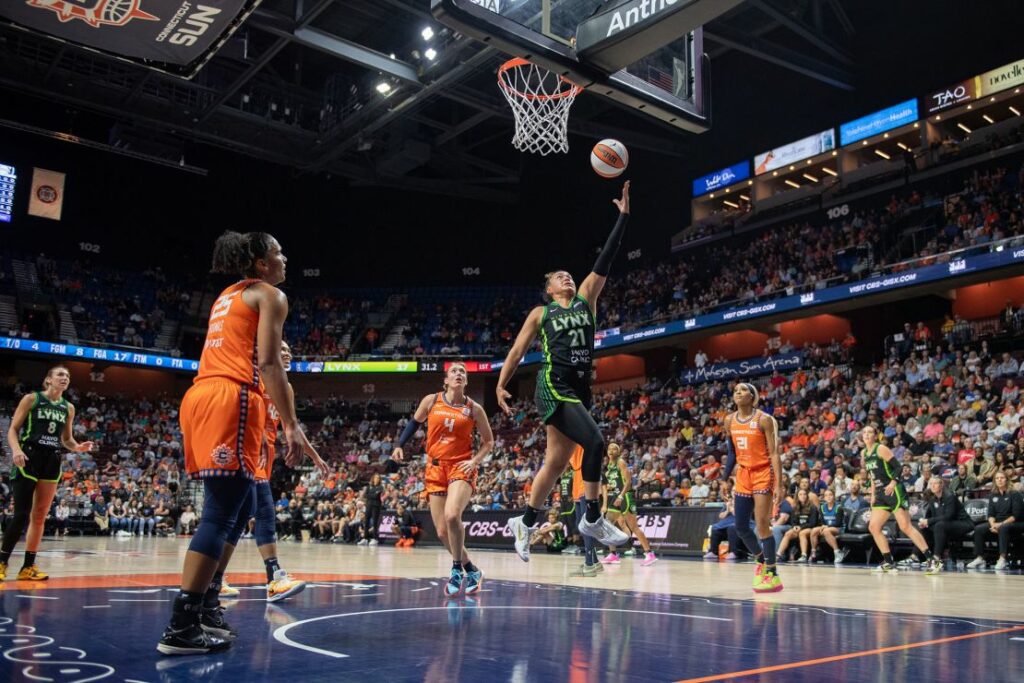 Minnesota Lynx guard Kayla McBride shoots a layup against the Connecticut Sun.