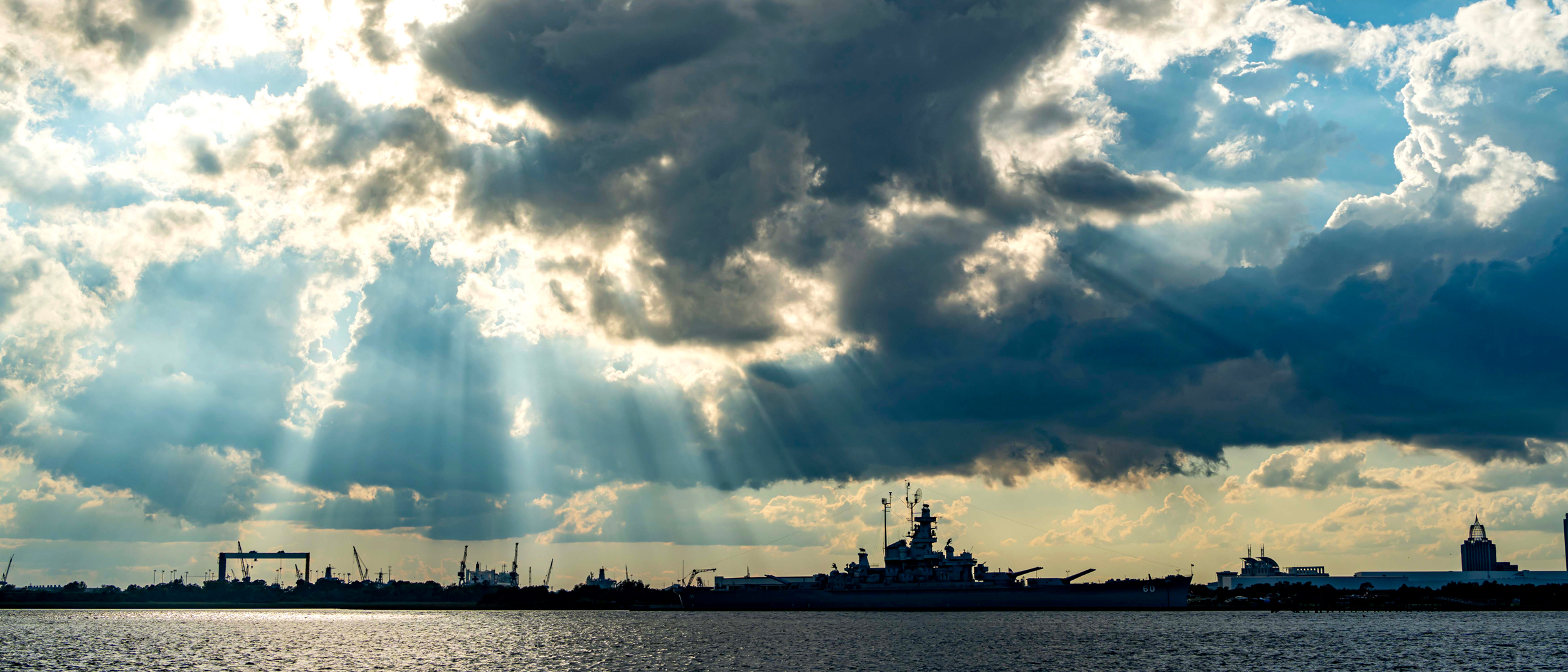 The retired USS Alabama battleship is now a tourist attraction along the Mobile Bay Causeway, just outside the city of Mobile, Alabama. Credit: Lee Hedgepeth/Inside Climate News