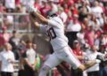 Alabama tight end Josh Cuevas (#80) catches a pass from Jalen Milroe for a touchdown in 2024 game against Wisconsin.