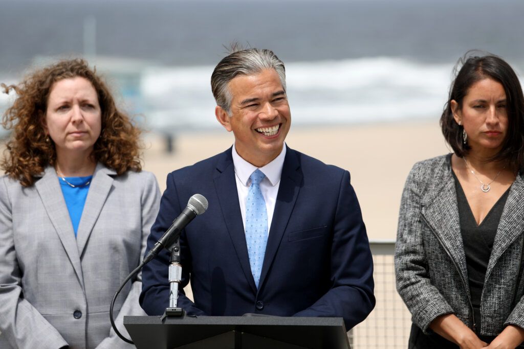 California Attorney General Rob Bonta, flanked by his legal team, announce that his office has launched an investigation into the fossil fuel and petrochemical industries alleged role in the plastic pollution crisis on April 28, 2022 in Playa Del Rey, California. Credit: Gary Coronado/Los Angeles Times via Getty Images