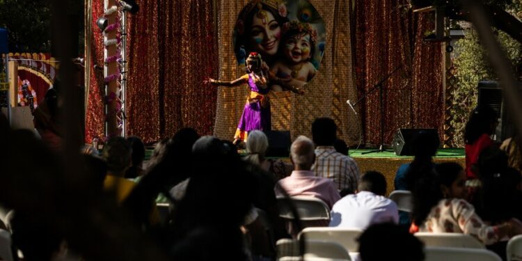 Singers and dancers take the stage to perform during the first day of the Krishna Janmashtami festival on Aug. 25, 2024, at ISKCON of Cedar Park.