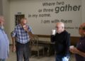 Congregation members of Connection Christian Church gather for a conversation before the start of the church’s Classic service Sunday, Aug. 11, 2024, in Odessa.