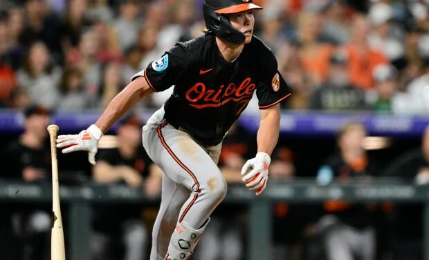 Baltimore Orioles second baseman Jackson Holliday (7) watches the flight of the ball on an RBI triple off of Colorado Rockies pitcher Angel Chivilli (57) in the 9th inning at Coors Field in Denver on Friday, Aug. 30, 2024. (Photo by Andy Cross/The Denver Post)