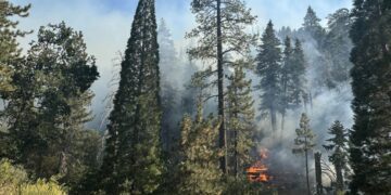 Bridge, Line fires rage in southern California, thousands evacuated