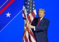 Donald Trump Hugs US Flag