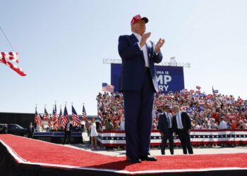 Donald Trump arrives for a campaign rally