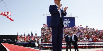 Donald Trump arrives for a campaign rally