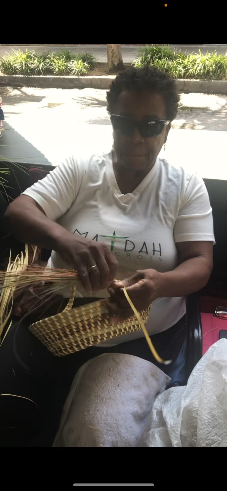 Cheryl Weston of Mount Pleasant makes sweetgrass baskets in the market in downtown Charleston. Her mother rented the space in the early 1970s.