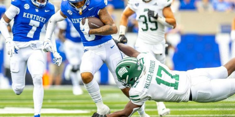 Ohio defensive end Marcel Walker-Burgess (17) tries to tackle Kentucky wide receiver Dane Key (6) during Saturday’s game at Kroger Field.