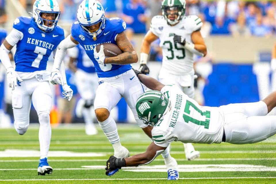 Ohio defensive end Marcel Walker-Burgess (17) tries to tackle Kentucky wide receiver Dane Key (6) during Saturday’s game at Kroger Field.