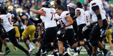 Northern Illinois celebrates after wining a NCAA college football game 16-14 against Notre Dame at Notre Dame Stadium on Saturday, Sept. 7, 2024, in South Bend.