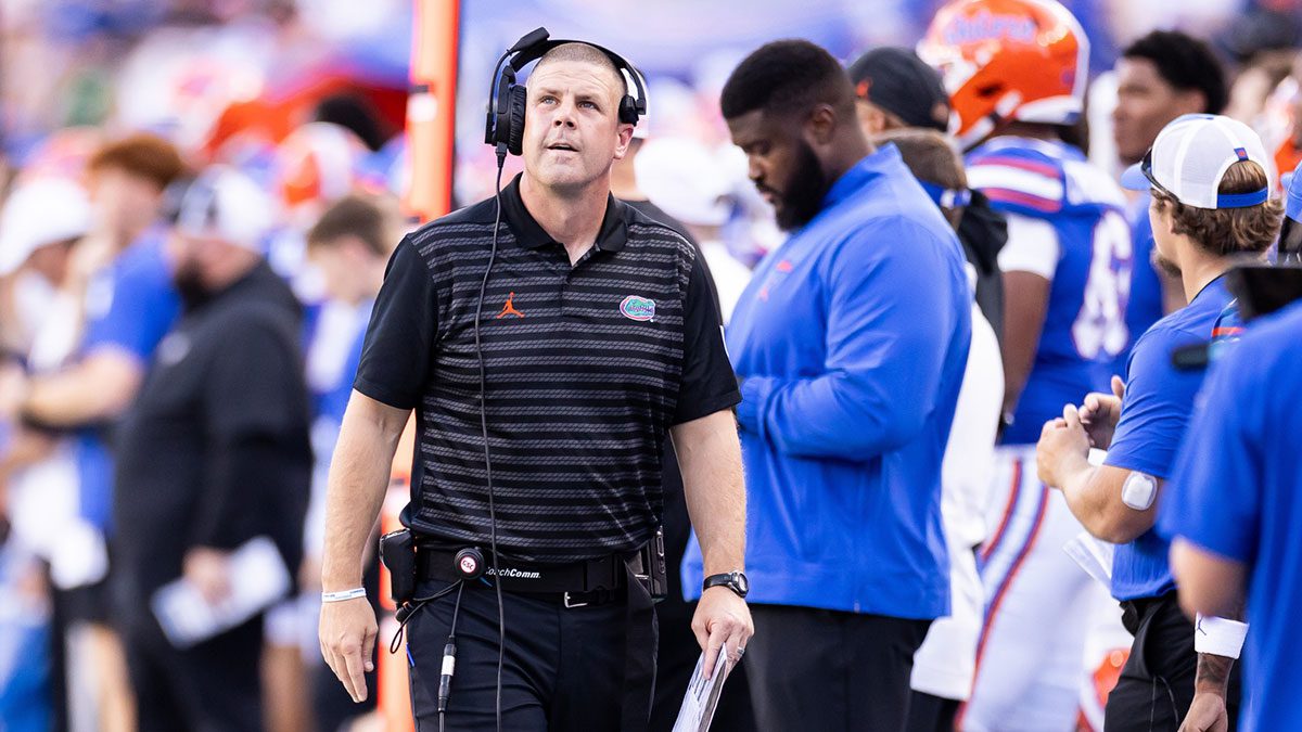 Florida Gators head coach Billy Napier walks on the sideline against the Miami Hurricanes during the second half at Ben Hill Griffin Stadium.