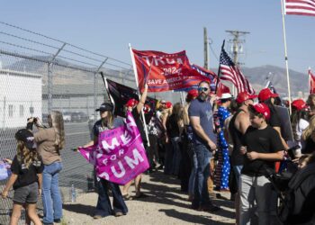 Trump supporters gather to watch Donald Trump’s plane land at Salt Lake City International Airport for a private fundraiser in Salt Lake City on Saturday.