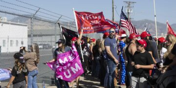 Trump supporters gather to watch Donald Trump’s plane land at Salt Lake City International Airport for a private fundraiser in Salt Lake City on Saturday.