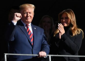 President Donald Trump and wife Melania address crowd during Alabama vs LSU game