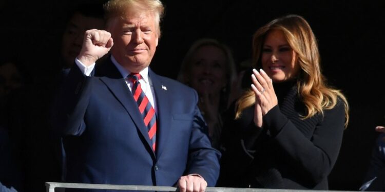 President Donald Trump and wife Melania address crowd during Alabama vs LSU game