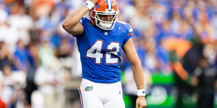 Aug 31, 2024; Gainesville, Florida, USA; Florida Gators long snapper Rocco Underwood (42) celebrates a tackle against the Miami Hurricanes during the second half at Ben Hill Griffin Stadium. Mandatory Credit: Matt Pendleton-USA TODAY Sports