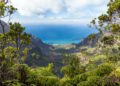 The Kalalau Valley between sheer cliffs in the Na Pali Coast State Park on the western shore of the island of Kauai in Hawaii, United States. This view is from the Pihea Trail in the Kokee State Park.