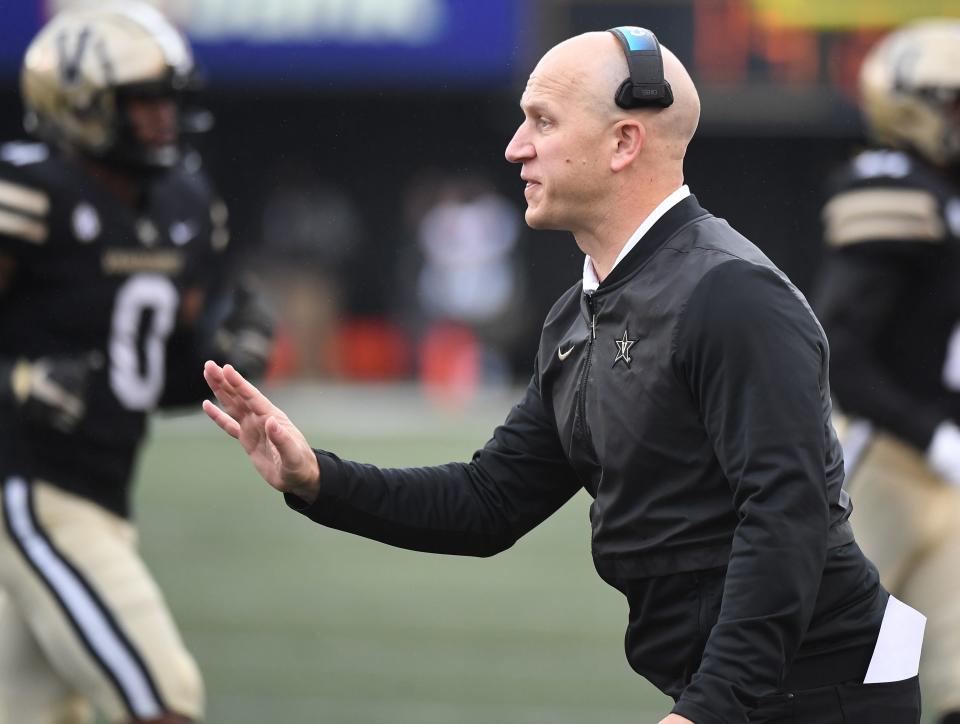 Oct 30, 2021; Nashville, Tennessee, USA; Vanderbilt Commodores head coach Clark Lea talks with an official during the first half against the Missouri Tigers at Vanderbilt Stadium. Mandatory Credit: Christopher Hanewinckel-USA TODAY Sports