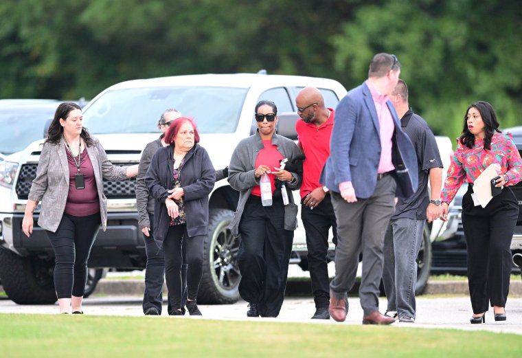 WINDER, GEORGIA - SEPTEMBER 6: Victim relatives arrive at the Barrow County Courthouse where a bond hearing is being held for school shooting suspect Colt Gray on September 6, 2024 in Winder, Georgia. Two students and two teachers were shot and killed at Apalachee High School on September 4, and the 14-year-old suspect, who is a student at the school, is expected to be tried as an adult on September 6, 2024. (Photo by Adam Hagy/Getty Images)