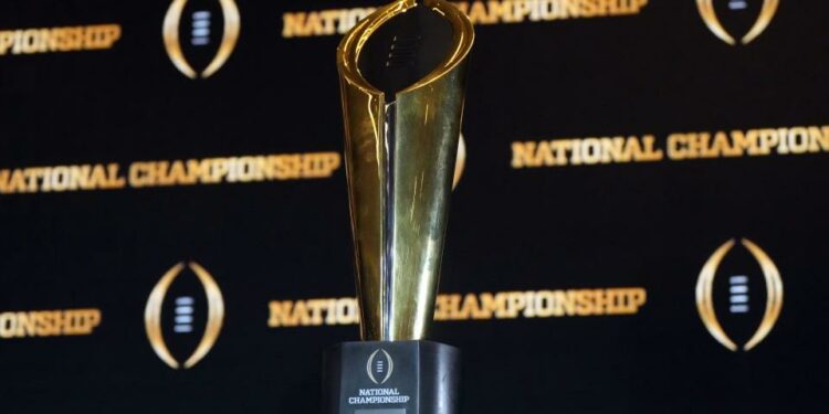 Jan 10, 2023; Los Angeles, CA, USA; The College Football Playoff National Championship trophy at CFP Champions press conference at Los Angeles Airport Marriott. Mandatory Credit: Kirby Lee-USA TODAY Sports