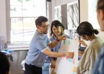 Hyundai Motor Group designers and engineers working with faculty and staff in RISD's Edna W. Lawrence Nature Lab in August 2024 (photo credit: Jo Sittenfeld).