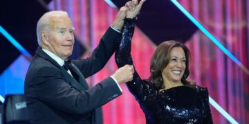 Biden raises Harris' hand