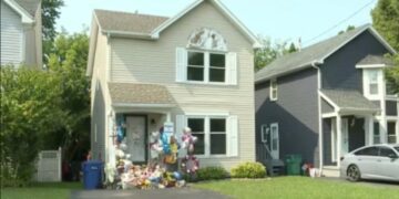 Moreno family home on Knapp street with vigil