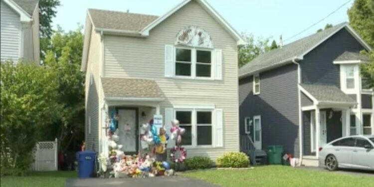 Moreno family home on Knapp street with vigil