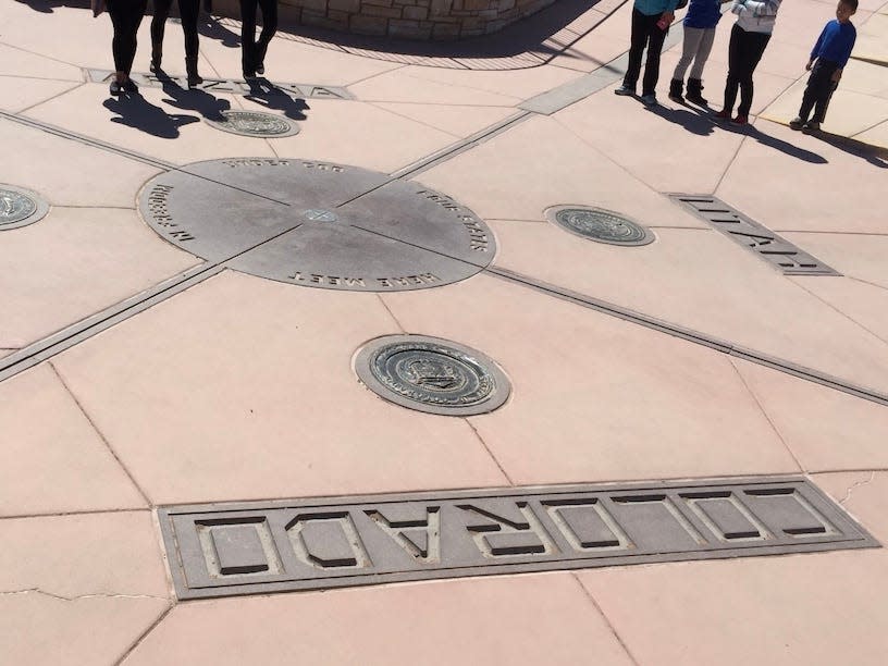 The Four Corners Monument, showing the borders of Colorado, Utah, Arizona, and New Mexico meeting.