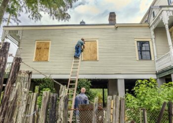 The windows of a raised historic house are boarded up as residents prepare for the arrival of Hurricane Francine along the Louisiana coast on Sept. 9, 2024, in Lafitte, Louisiana.