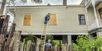 The windows of a raised historic house are boarded up as residents prepare for the arrival of Hurricane Francine along the Louisiana coast on Sept. 9, 2024, in Lafitte, Louisiana.